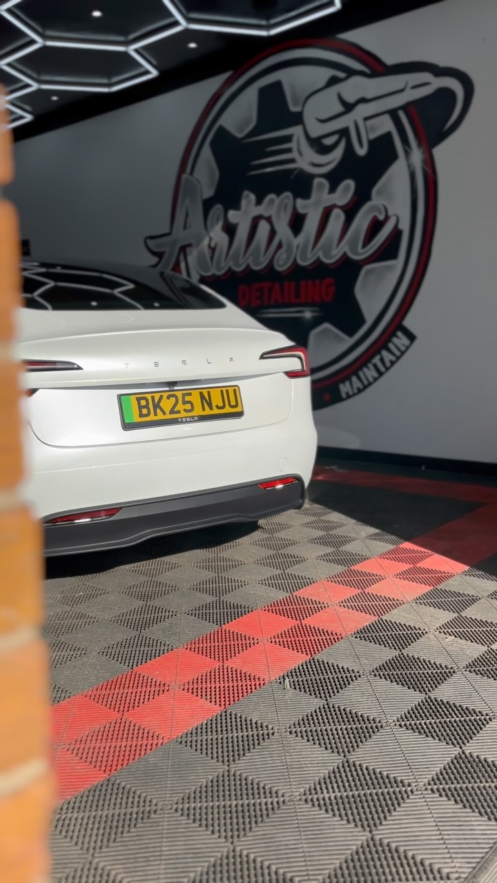 White vehicle rear detail in studio