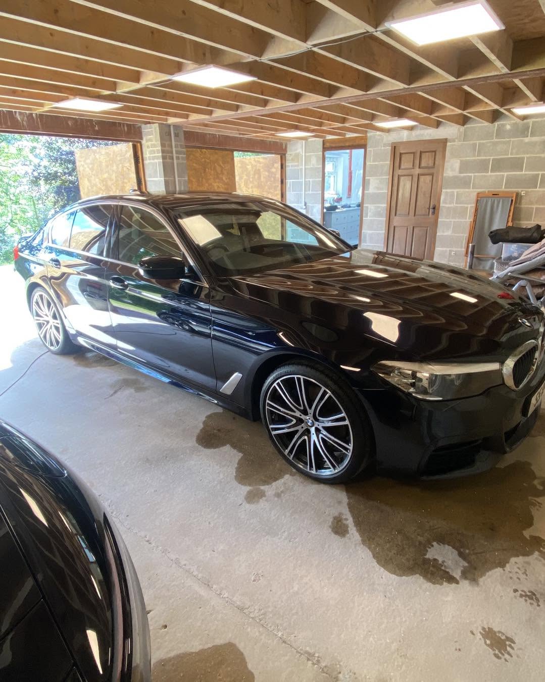Black BMW 5 Series finished in the studio