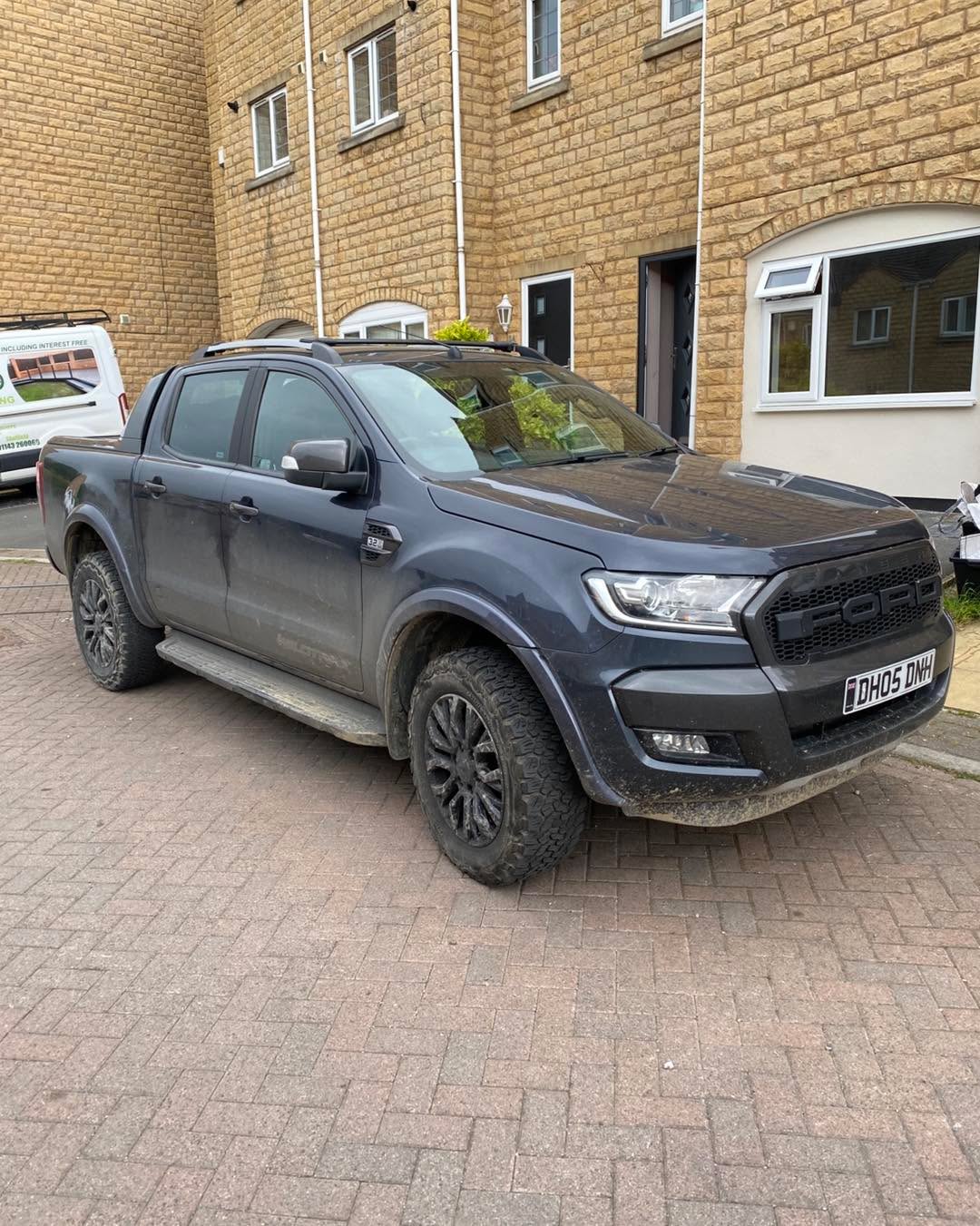 Matte black Ford Ranger after a full valet