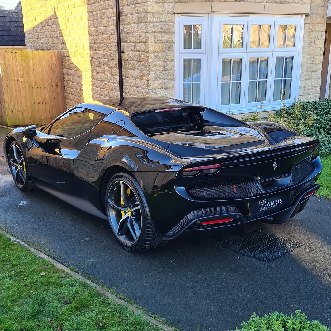 Black Ferrari sports car pristine finish by MB Valets Leeds